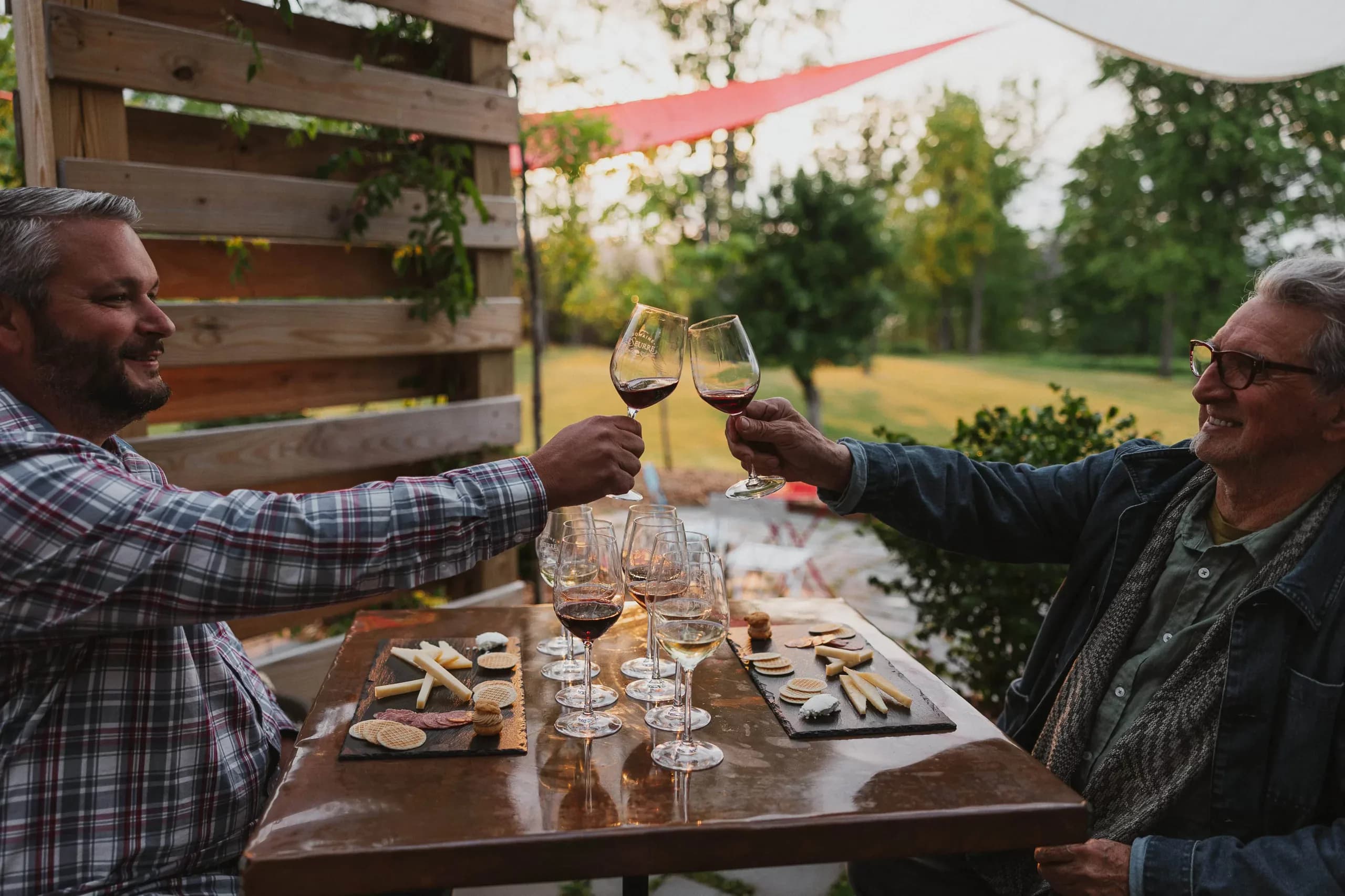 A wine and food pairing set out on the terrace at Domaine LeSeurre above Keuka Lake