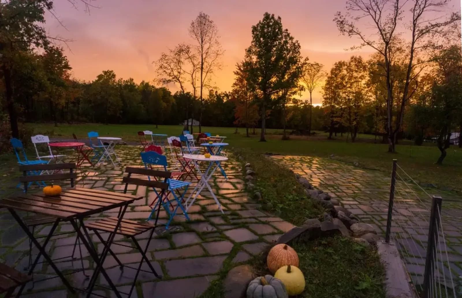 Guests together on the terrace above Keuka Lake
